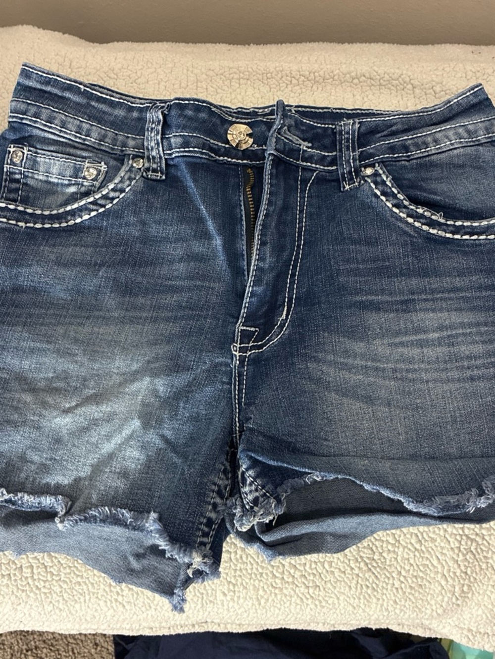 Women’s Dark Blue Distressed Denim Cutoff Shorts